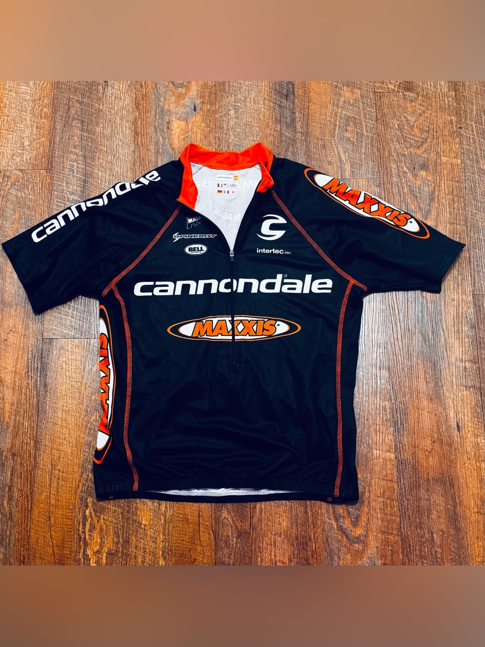 Cannondale Men’s Black & Orange Cycling Jersey with Maxxis Logos